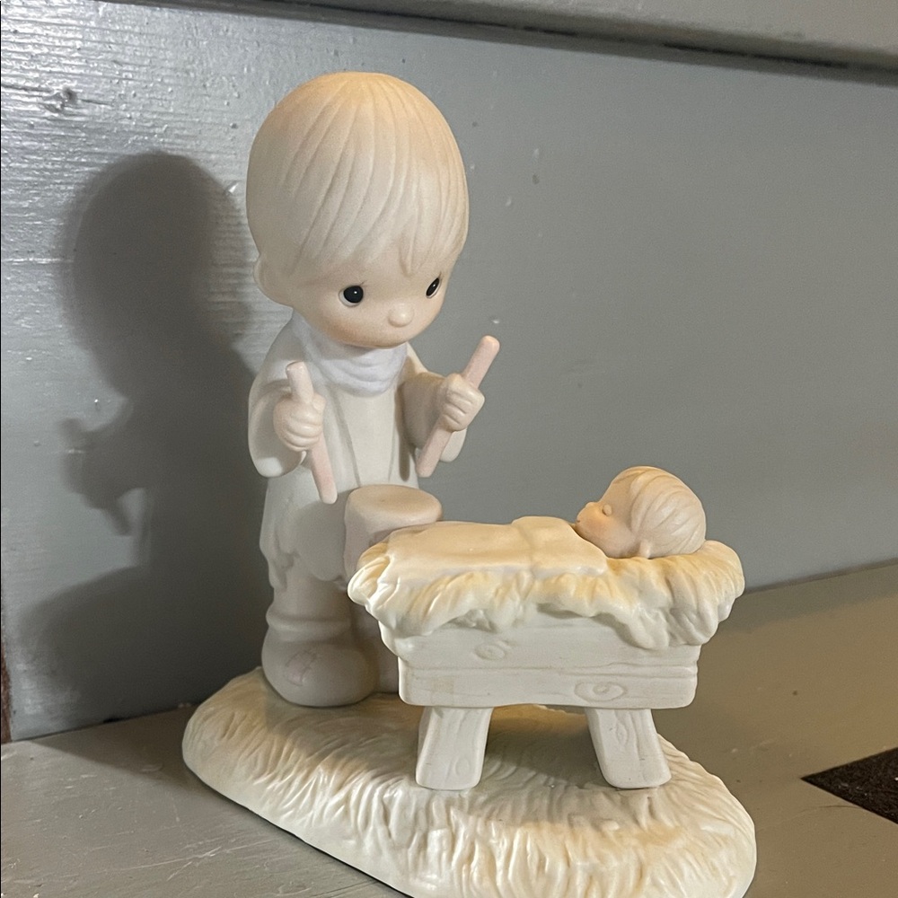 Adorable Figurine with Child and Baby